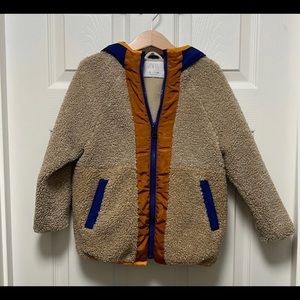 Sherpa, teddy bear style, warm, cozy, hood, zippered pockets